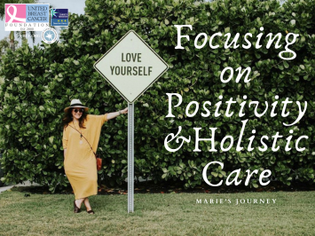 This image features Marie standing in front of a 'love yourself' sign. She is focusing on positivity and holistic care.
